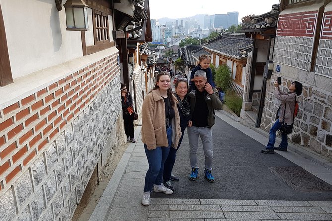7 Day Essential Korea Tour(Seoul, Nami, DMZ, Andong, Gyeongju, Busan_Meal Incl.) - Busan by the coast: Haedong Yonggungsa, Nurimaru APEC House, Dongbaekseom, Jagalchi, and UN Memorial Cemetery
