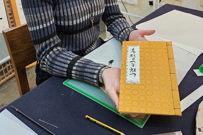 Create a Handmade Traditional Korean Notebook in Insadong - Making the binding holes: where the craft shows