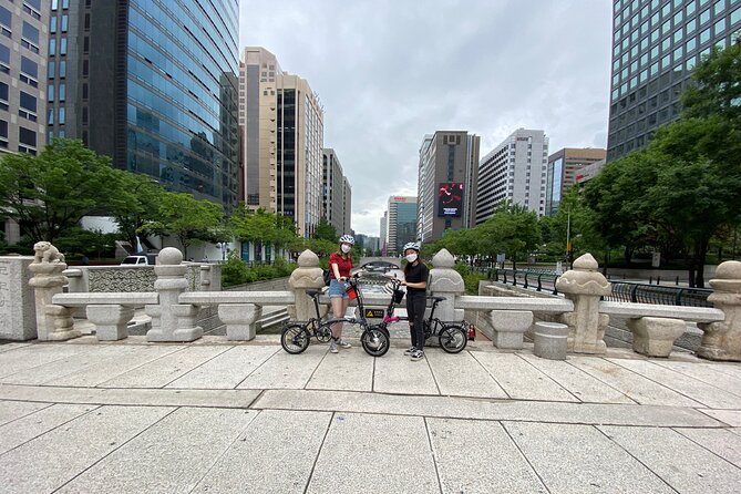 Market Food Tour & Evening E-bike Ride in Seoul - Kwangjang Market street food: how to shop and eat without stress