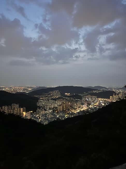 Seoul: Inwangsan Sunset Hike with Guide - Beombawi Rock: the night view plus the snack-and-photo pause