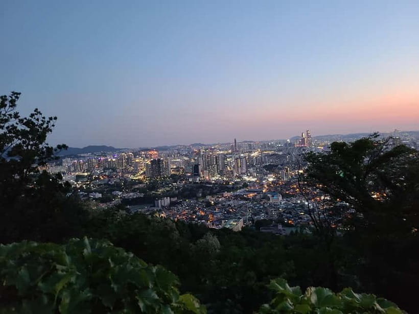 Seoul: Night Namsan Hiking with Hidden Gem Recommendations - Starting at Myeongdong: elevator views and getting your bearings fast