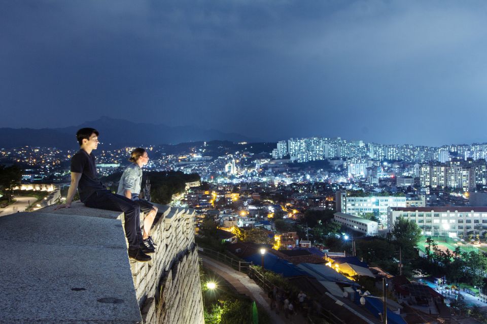 Seoul: Nighttime Hidden Gems Walking Tour - The Hanyang City Wall at night: where the skyline changes