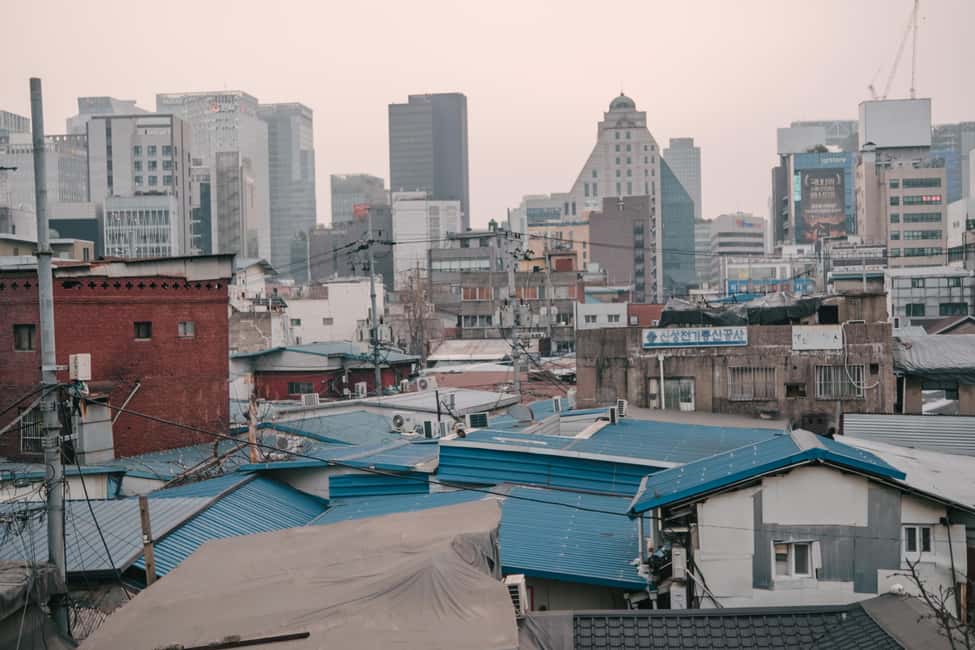 Seoul: Street Photoshoot and Hidden Gem History Walking Tour - Cheonggyecheon at golden hour: the waterline that softens everything